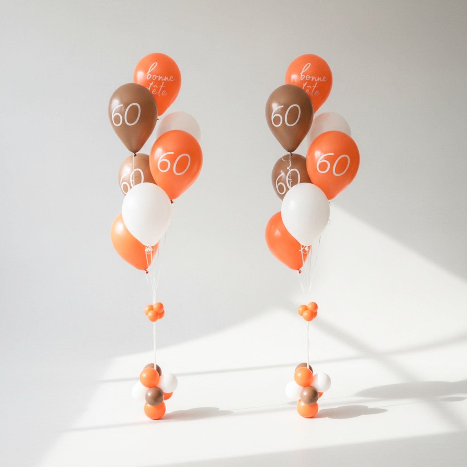 60th Birthday Balloon Bouquet in brown and orange with French bonne fête Decals 