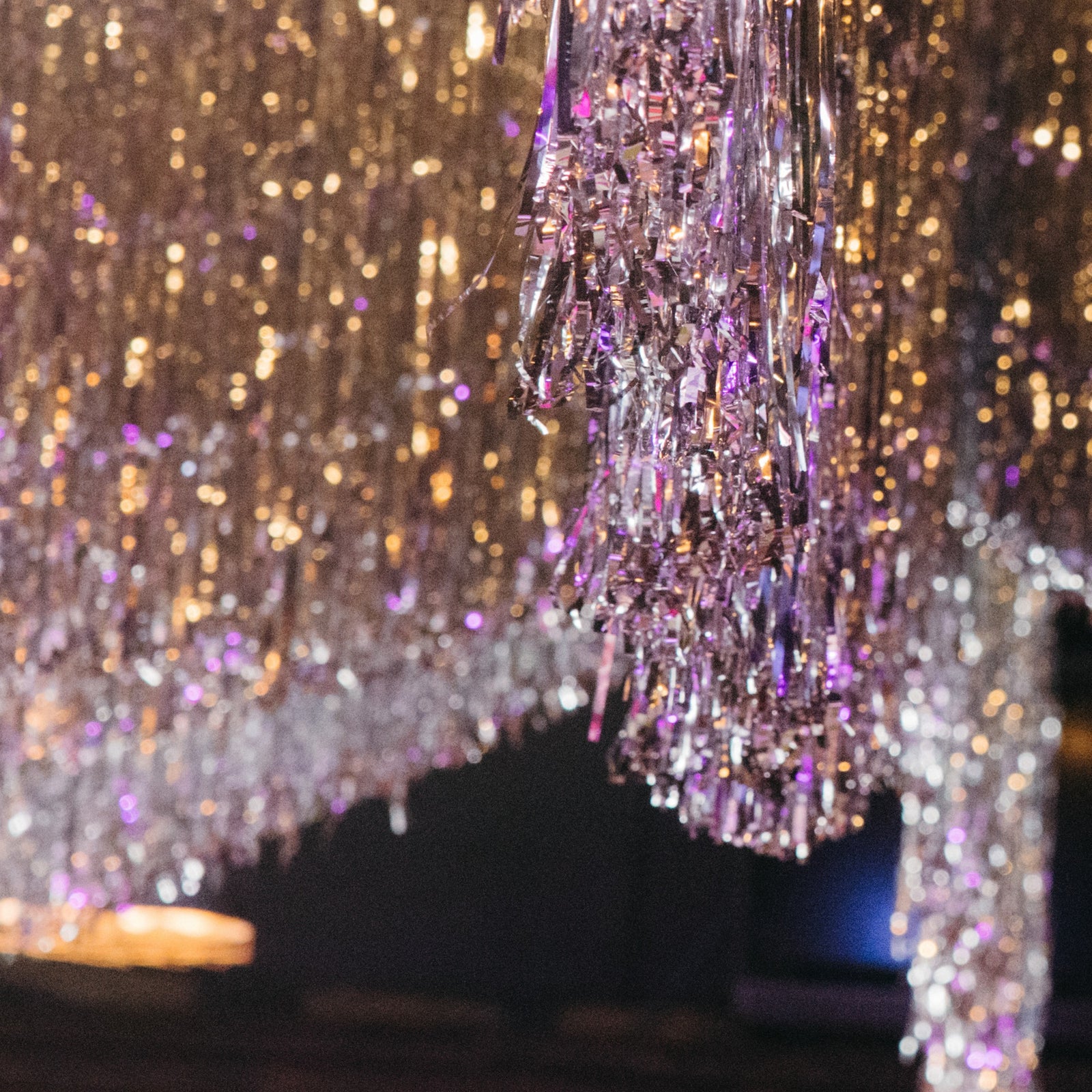 Ceiling Silver Tinsel Garlands At a wedding